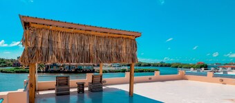 Cozy Waterfront Home w/Shared Pool, Water Views, WiFi, & AC - Walk to the Beach