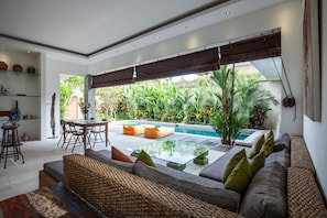 Basic Villa, Multiple Beds | Living room | 32-inch TV with digital channels, streaming services, stereo - Villa Kambodja (Seminyak)