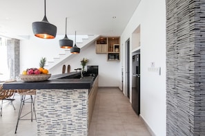Basic Villa, Multiple Beds | Private kitchen | Fridge, microwave, stovetop, coffee/tea maker