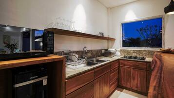 Basic Villa, Multiple Beds | Private kitchen | Fridge, microwave, stovetop, coffee/tea maker