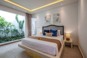 Basic Villa, Multiple Beds | Bathroom | Free toiletries, hair dryer, towels, soap