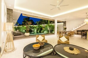 Basic Villa, Multiple Beds | Living room | 50-inch Smart TV with digital channels, streaming services, stereo - Villa Hugo (Canggu)