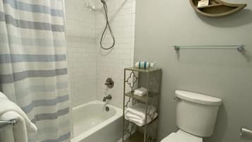 Combined shower/bathtub, hair dryer, towels, soap