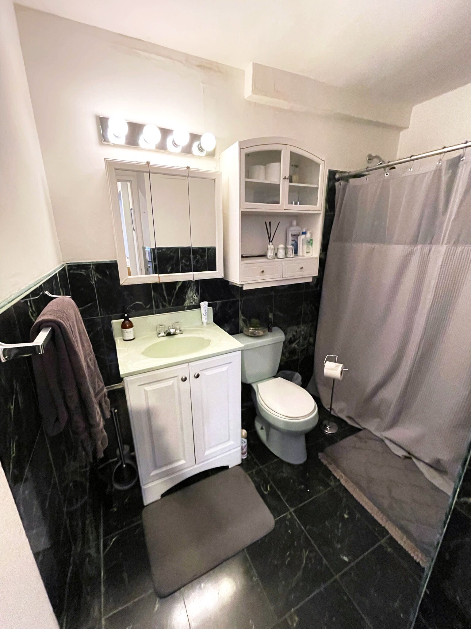 Combined shower/tub, hair dryer, towels, soap