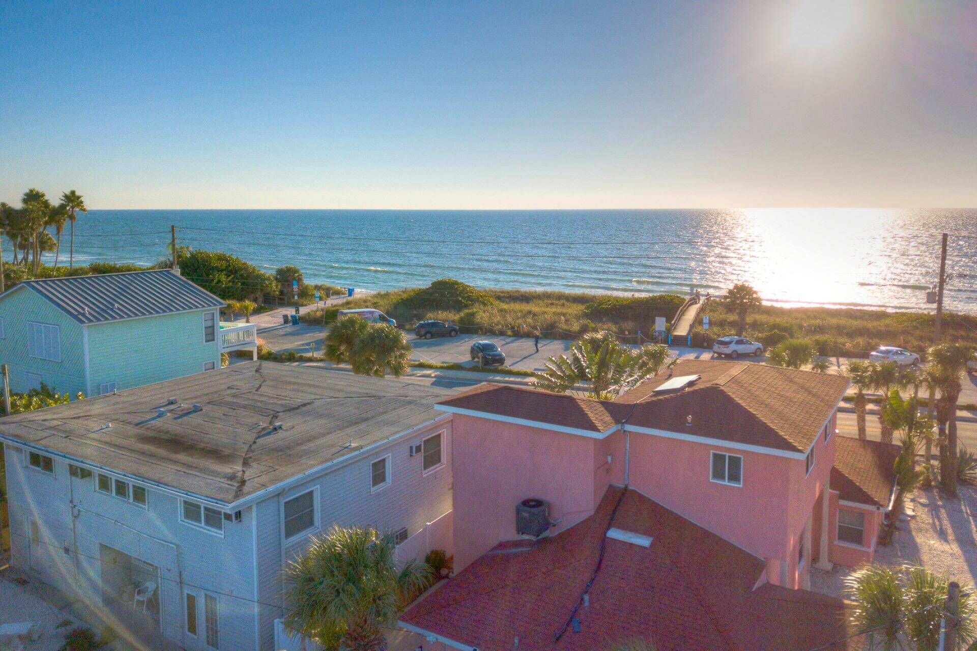 Simple Florida. Exceptional Location. Beautiful Grounds. Steps to the Beach.