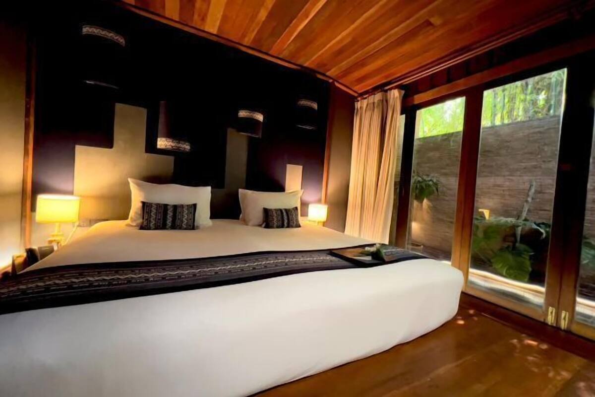 Lakens van Egyptisch katoen, luxe beddengoed, een minibar