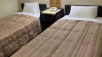 Twin Room, Non Smoking | Free WiFi, bed sheets
