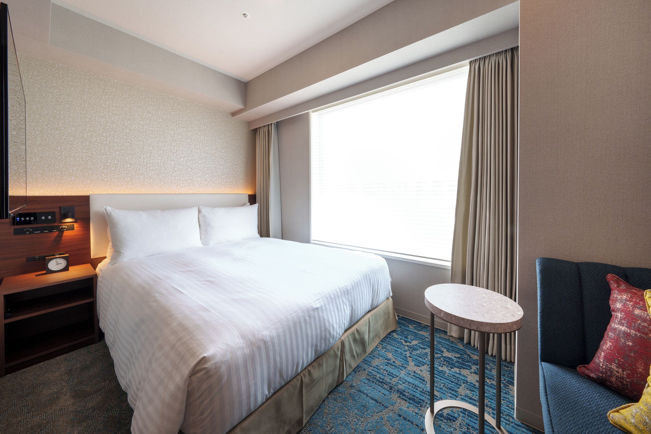 Down duvets, pillow-top beds, in-room safe, desk