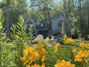 Exterior detail - Lakefront Bliss: Spacious Home on Lake Ann perfect for Large Family 25 min to TC (Lake Ann)