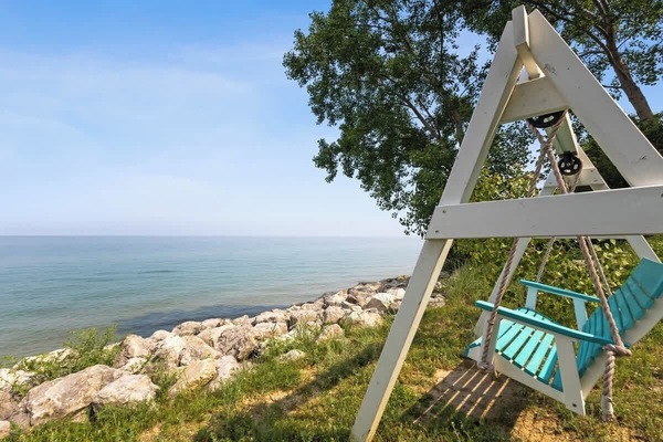 Sway by the shore and soak in the lakefront serenity.