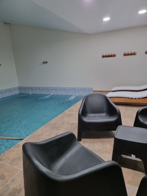 Alberca techada y alberca climatizada