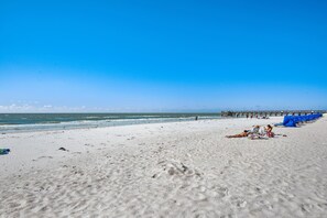 On the beach, sun-loungers, beach towels