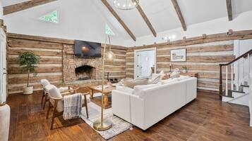 Smart TV, fireplace, books, offices