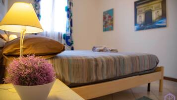 Apartment, 1 Queen Bed | 1 bedroom, iron/ironing board, free WiFi, bed sheets