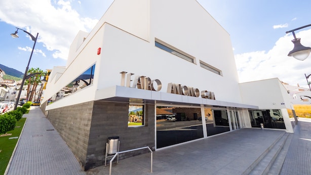 A modern building with a prominent sign reading "TEATRO ANTONIO".