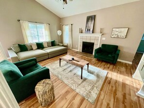 Smart TV, fireplace, books, offices