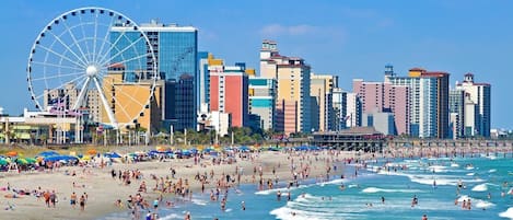 On the beach, sun-loungers