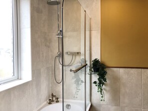 Combined shower/tub, hair dryer, bathrobes, towels