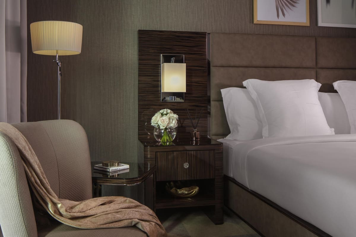 Hypo-allergenic bedding, down comforters, minibar, in-room safe