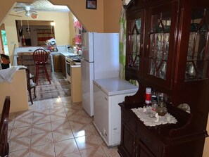 Fridge, oven, coffee/tea maker, cookware/dishes/utensils