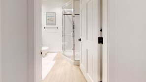 Combined shower/bathtub, hair dryer, towels, soap