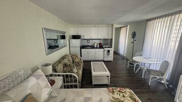 Iron/ironing board, travel crib, free WiFi, bed sheets