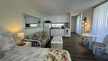 Iron/ironing board, travel crib, free WiFi, bed sheets