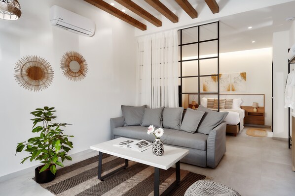 Suite Junior, vue jardin | Draps italiens Frette, literie de qualité supérieure