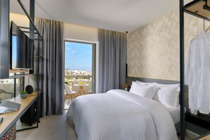 Frette Italian sheets, premium bedding, Tempur-Pedic beds, in-room safe
