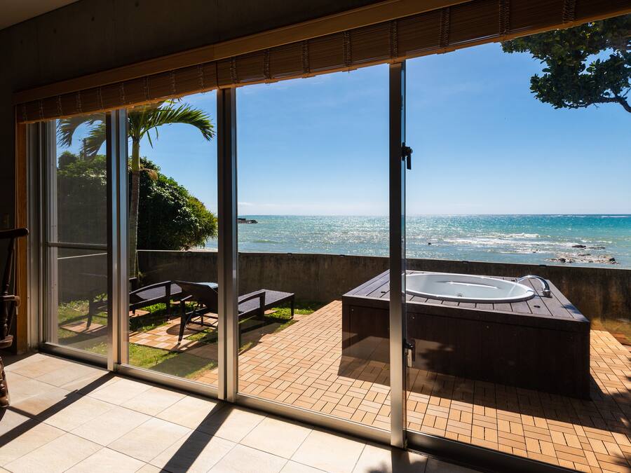 Pine House in Ginoza, Non Smoking (Beach Front) | Living area | Flat-screen TV