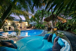 A heated pool - Just 10min to downtown Ft. Lauderdale & beach, this modern home offers everything a group could want for an upscale relaxing getaway. Unwind in the very private and peaceful backyard oasis, featuring a heated pool ($), 6-person hot tub & fire pit. (Fort Lauderdale)