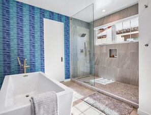 Bathtub, hair dryer, towels