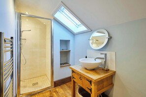 Bathtub, hair dryer, towels