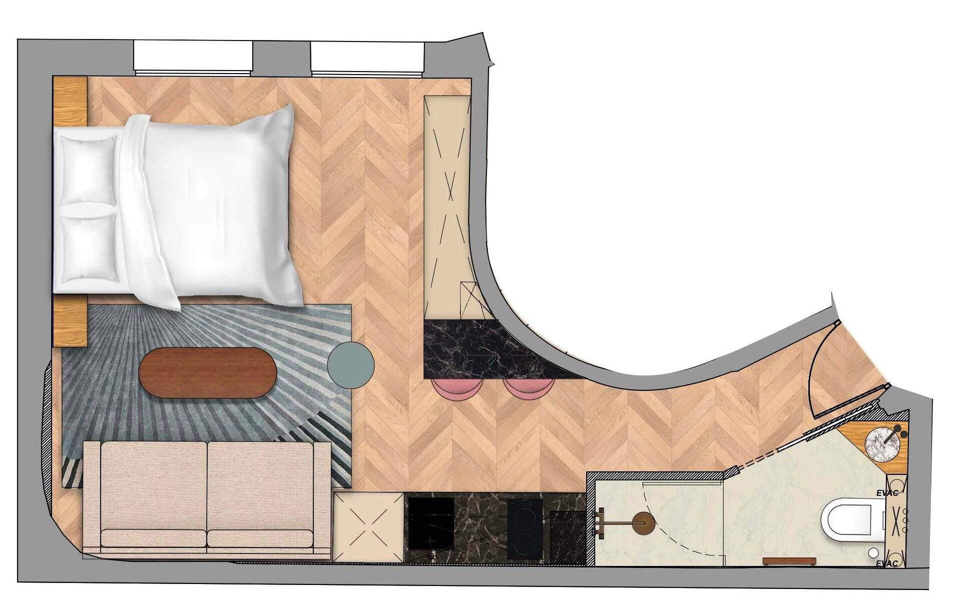A hotel room layout with a bed, sofa, bathroom, and kitchenette.