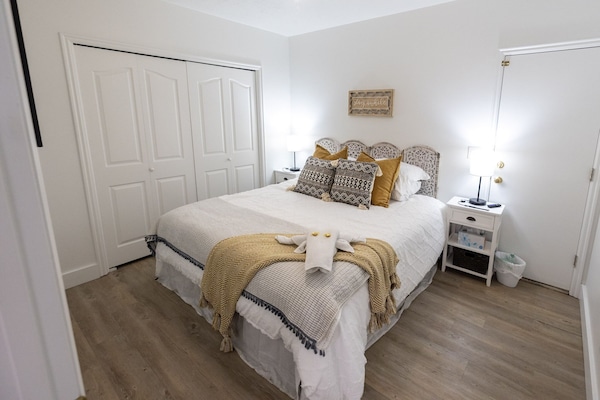 1 bedroom, desk, iron/ironing board, travel crib