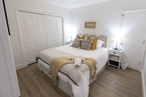1 bedroom, desk, iron/ironing board, travel cot