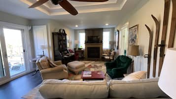 Smart TV, fireplace, books