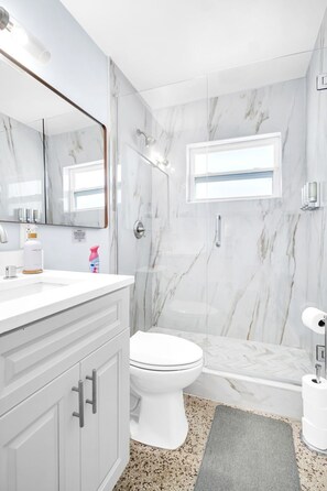 Bathtub, hair dryer, towels