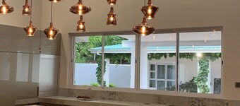 Modern renovated house, set in a stunning 2 acre botanic garden. 