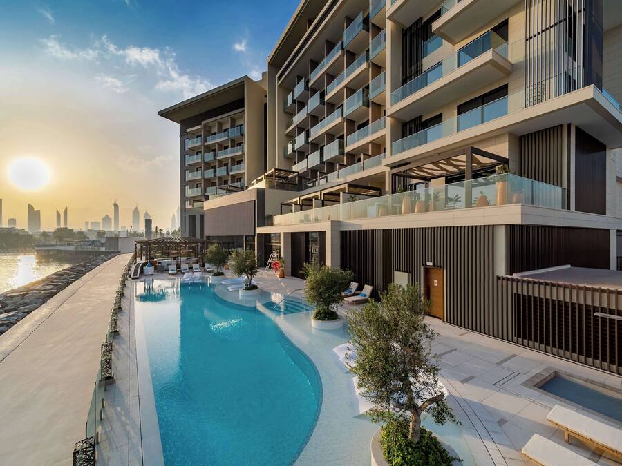 Outdoor pool, open 8:30 AM to 8:00 PM, pool loungers