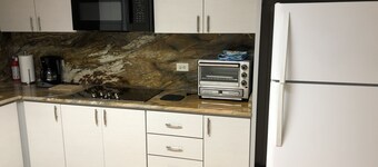 Stunning views from private terrace, full A/C, WiFi, walk to beach