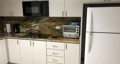 Stunning views from private terrace, full A/C, WiFi, walk to beach