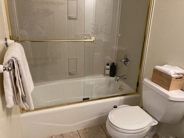 Shower, towels, soap, shampoo