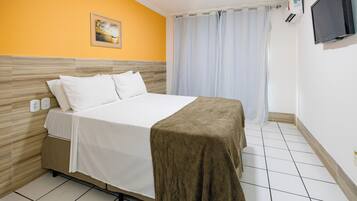 Quarto duplo standard, 1 cama de casal | Frigobar, roupa de cama