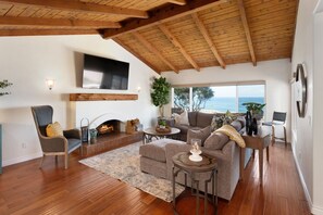 TV, fireplace - Stunning Ocean-view Oasis w/ Pool, Spa & Patio (San Diego)