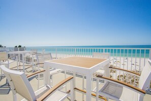 Outdoor dining - Beachfront 2/2 Condo on Treasure Island, 305W Oceana (Treasure Island)