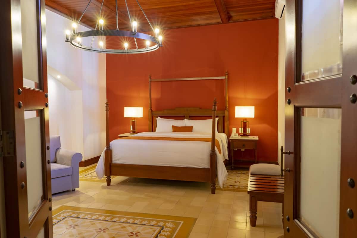 Junior Suite | 1 bedroom, in-room safe, iron/ironing board, free WiFi