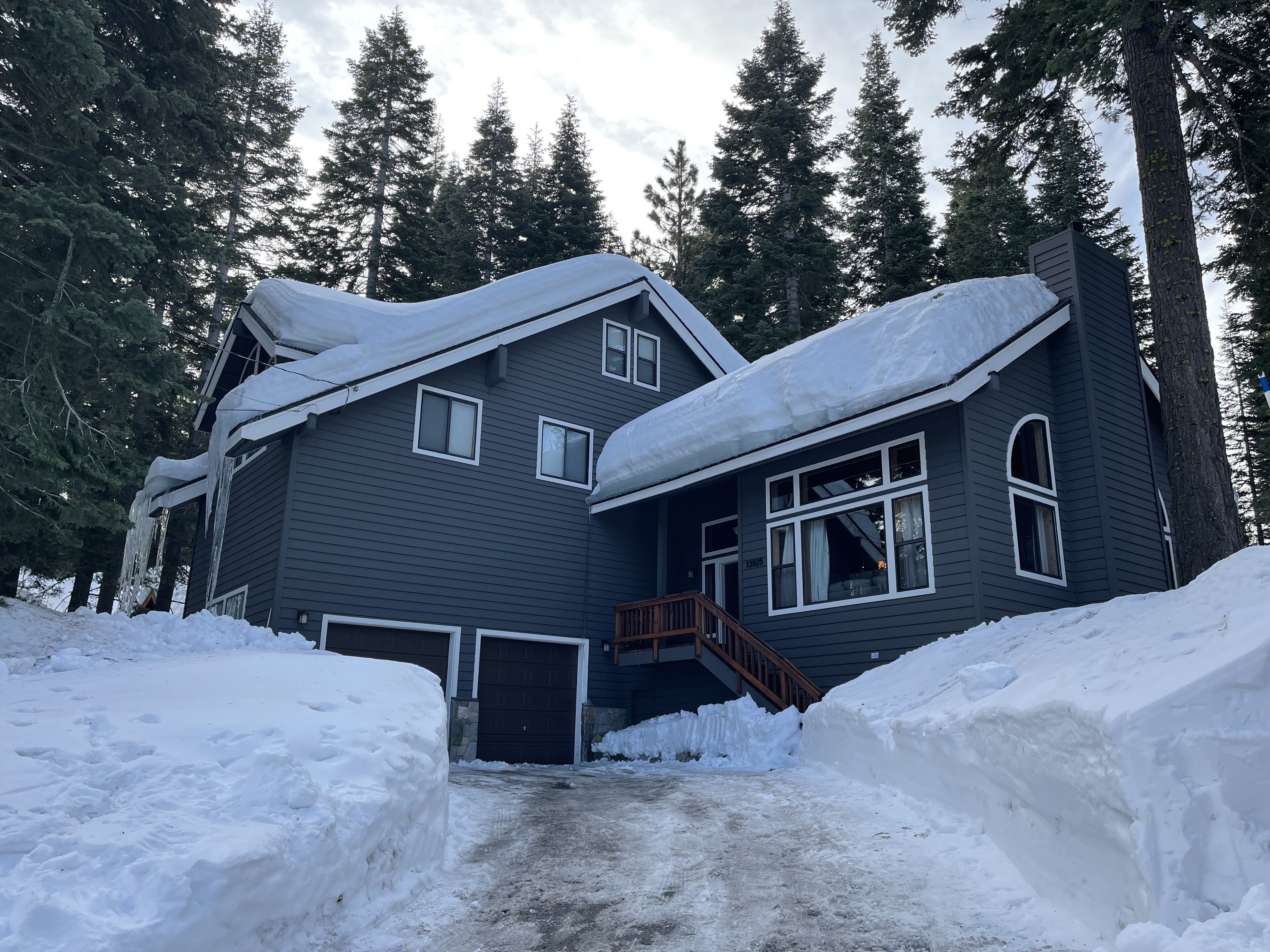 Cabin-inspired home with pool, private hot tub, fast WiFi, & deck