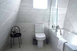 Bathtub, hair dryer