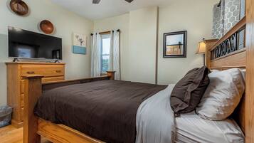 2 dormitorios, caja fuerte, tabla de planchar con plancha